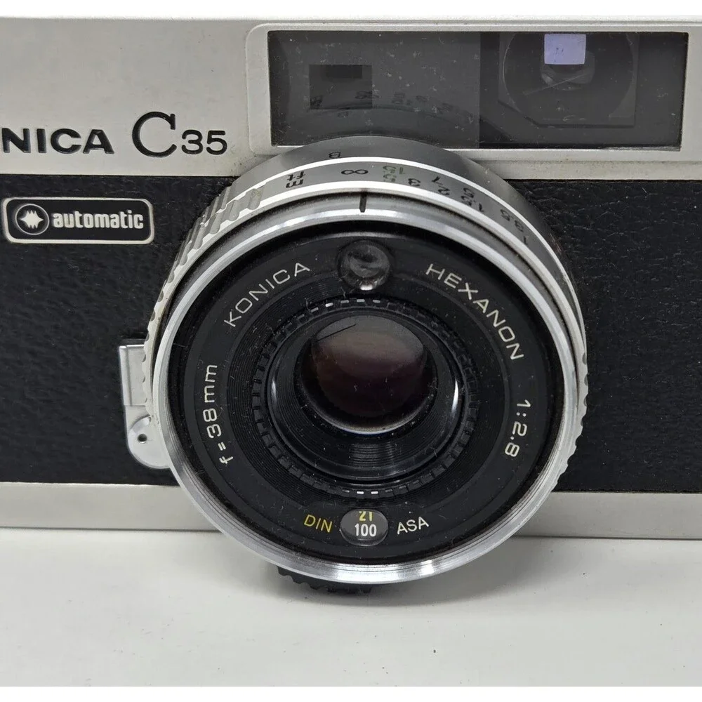 Konica C35 Automatic 35mm Film Camera Hexanon 38mm f/2.8 Shutter Fires Japan